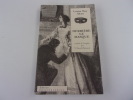 DERRIERE LE MASQUE. ALCOTT Louisa May