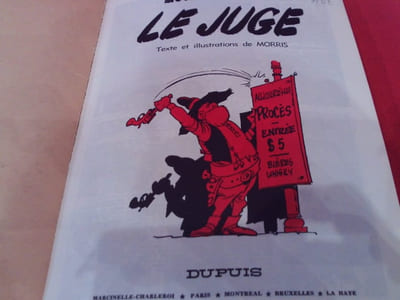 Le juge. 