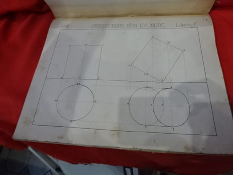 Cahier regroupant un ensemble de dessins techniques scolaires montés sur onglet. . [VARIA] - LIBERTY (François)