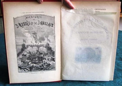 Aventures de trois Russes et de trois Anglais dans l'Afrique Australe. (Steamer, rouge)