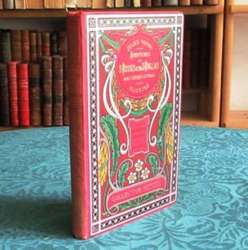 Aventures de trois Russes et de trois Anglais dans l'Afrique Australe. (Feuilles d'Acanthe, rouge). VERNE Jules