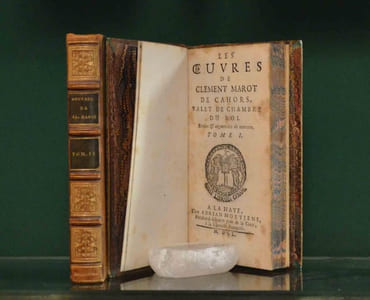 Les oeuvres de Clement Marot de Cahors, Valet de chambre du roi. Revûes & augmentées de nouveau.