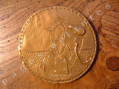 Médaille en bronze dans sa boite cartonnée.