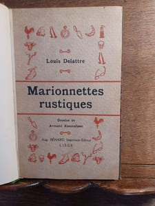 Marionnettes rustiques montrant les bonnes petites gens à leurs métiers, en douze contes avec dessins de Armand Rassenfosse. 