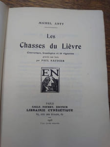 Les chasses du Lièvre. Couverture, frontispice et 16 vignettes gravées sur bois par Paul Baudier. 