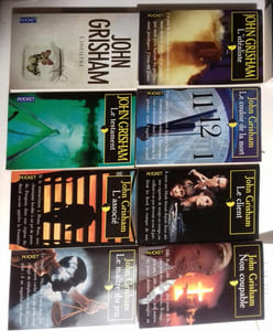 8 romans : Non coupable - Le Client - Le Couloir de la mort - L’Idéaliste - Le Maître du jeu - L’Associé - Le Testament - L’Infiltré .