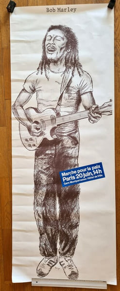 Affiche repr&eacute;sentant Bob Marley, illustr&eacute;e par Sergio Birga, &agrave; l'occasion de la Marche pour la Paix, qui eut lieu &agrave; Paris en 1982.. ( Bob Marley ) - ...