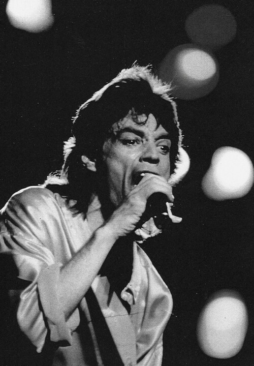 Magnifique photographie en retirage noir et blanc, sur papier photo, de Mick Jagger.. ( Photographies - Musique - The Rolling Stones ) - Sir Michael ...