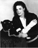 Magnifique photographie en retirage noir et blanc, sur papier photo de Michael Jackson avec sa panthère noire.. ( Photographies - Musique - Cinéma ) - ...
