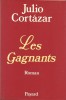 Les Gagnants. Roman. ( Dédicace de Julio Cortázar à l'écrivain Serge Fortis-Rolle ).. Julio Cortázar.