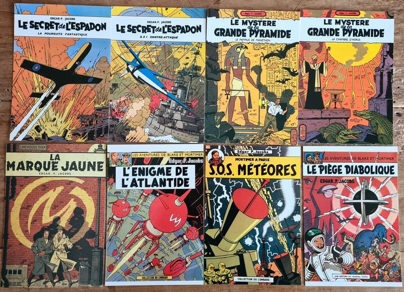 Superbe lot de 26 cartes postales illustr&eacute;es par Edgar Pierre Jacobs, reprenant les couvertures des 10 premiers albums + le Rayon U + de nombreuses ...
