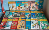LOT 19 TITRES LUCKY LUKE SOUPLE DOS BOIS &Eacute;TAT CORRECT. MORRIS