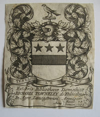 Exlibris Bibliothecae Domesticae Richardi Towneley de Towneley in Agro Lancastrensi, anno 1702. Copper-engraving : 9 x 7,5 cm, mounted to cardboard.