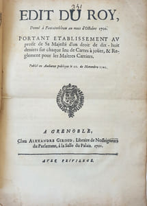 ÉDIT DU ROY, donné à Fontainebleau au moi d'octobre 1701, portant établissement au profit de sa majestéd'un droit de dix-huit deniers sur chaque jeu de cartes à jouer, et réglement pour le Maitres Cartiers?