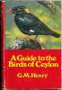 A guide to the birds of Ceylon.. Henry, G.M.