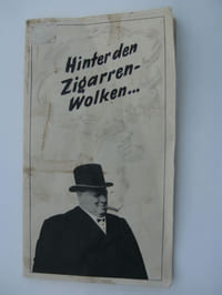 Hinter den Zigarrenwolken.