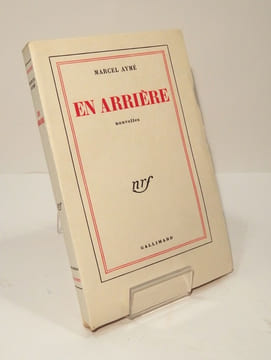 En arrière. AYME (Marcel)