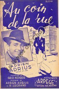 Partition de la chanson : Au coin de la rue . Adrius Adrien - Adrius A.,Legrand Raymond - Koger Géo
