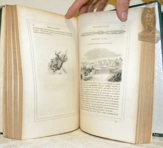L’ingénieux hidalgo Don Quichotte de La Manche. Traduit et annoté par Louis Viardot. Vignettes de Tony Johannot. 2 Volumes.. Cervantès Saavedra, ...