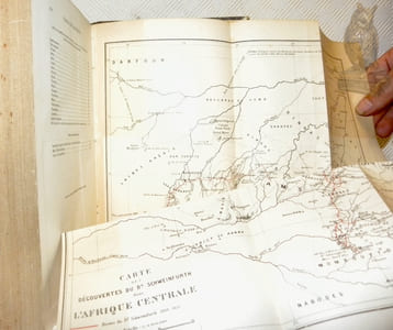 Au coeur de l’Afrique, 1868 - 1871, dans les régions inexplorées de l’Afrique centrale. Ouvrage traduit avec l’autrisation de l’auteur sur les éditions anglaise et allemande par Mme. H. Loreau et contenant 139 gravures et 2 cartes. Tome premier et tome second. (2 Volumes).