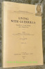 Living with guerilla. Guerilla as a legal problem and a political fact. These.. KOSSOY, Edward.