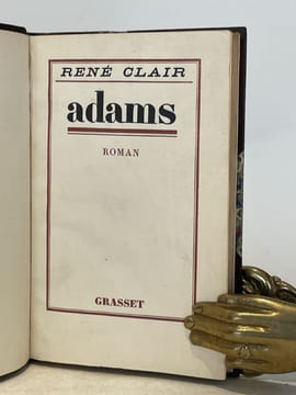 Adams. . CLAIR (René).
