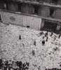 Tracts du PPF dispersés sur la chaussée devant le siège du Parti Populaire Français, rue des Pyramides. Photographie originale en tirage d'époque.. ...