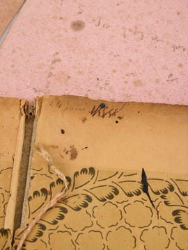 Distique autographe . sur le sous-main de la fille du poète, Geneviève Mallarmé. MALLARMÉ (Stéphane)