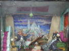 Amusant et insolite diorama r&eacute;alis&eacute; en papier, carton, tissu et mat&eacute;riaux divers, avec en fond une gouache figurant une vue de Montmartre et montrant ...