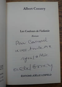 Les couleurs de l'infamie. Envoi autographe signé.