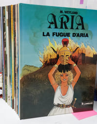ARIA (bande dessinée) du 1 au 15 -
1. La fugue d'Aria 08/1982
2. La montagne aux sorciers 08/1982
3. La septième porte 05/1983
4. Les chevaliers d'Aquarius 02/1984
5. Les larmes de la déesse 01/1985
6. L'anneau des Elflings 09/1985
7. Le tribunal des corbeaux 07/1986
8. Le méridien de posidonia 02/1987
9. Le Combat des dames 10/1987
10. Œil d'ange 05/1988
11. Les indomptables 10/1988
12. Janessandre 09/1989
13. Le cri du prophète 10/1990
14. Le voleur de lumière 11/1991
15. Vendéric